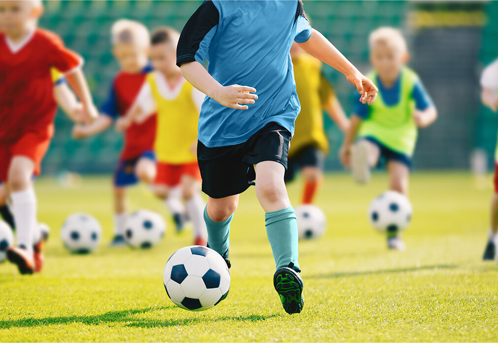 Children playing soccer