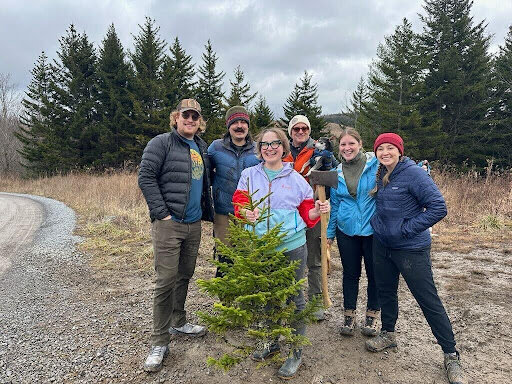 Pictured (from left): Ascend Greater Elkins members Nick Lennox, Paul Soldo, Amie Dillon, Leon Kaye, Chelsea Ferron, and Jennifer Wingerberg harvesting a Christmas tree from the Monongahela National Forest.